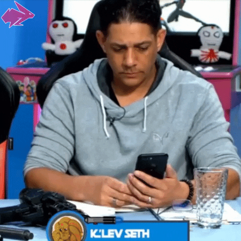 A gif of a man putting a phone down in disappointment. He must have visited a lead generation website that wasn't optimized for mobile!