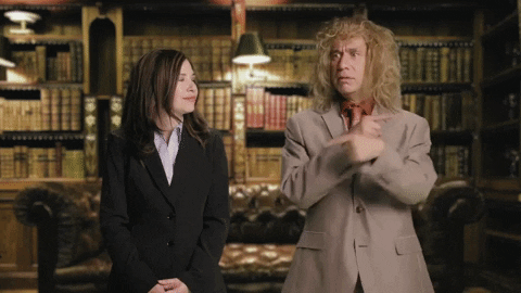 GIF of man pointing in many different directions