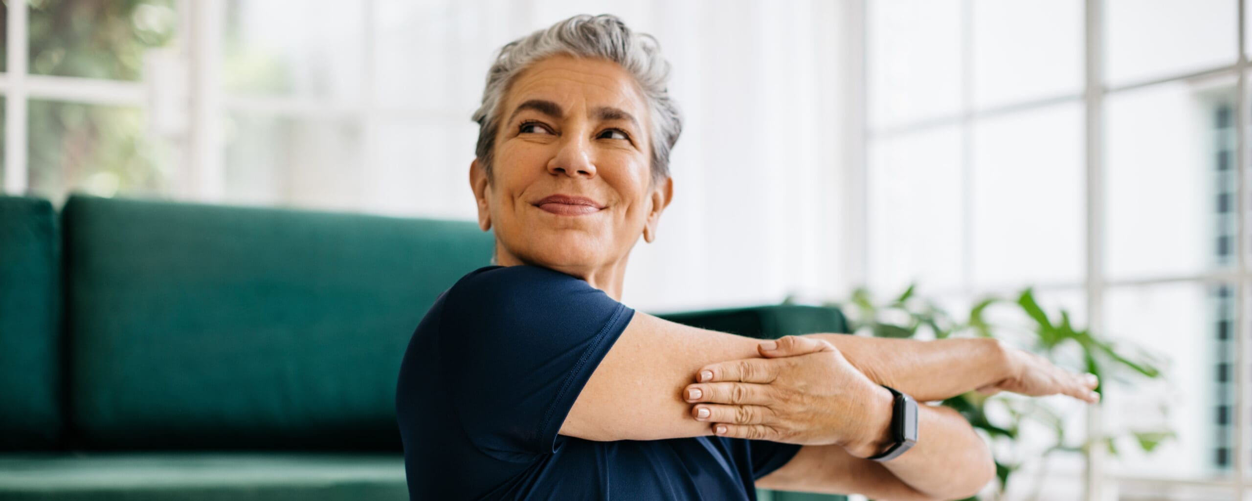 a woman is stretching