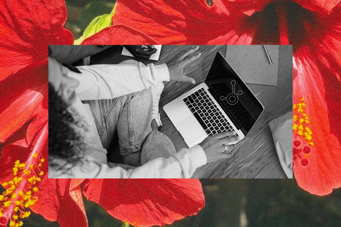 Person using a laptop with a nonprofit CRM integration graphic on screen, overlaid on a bold floral background representing connected tools and nonprofit tech stack integrations with HubSpot.